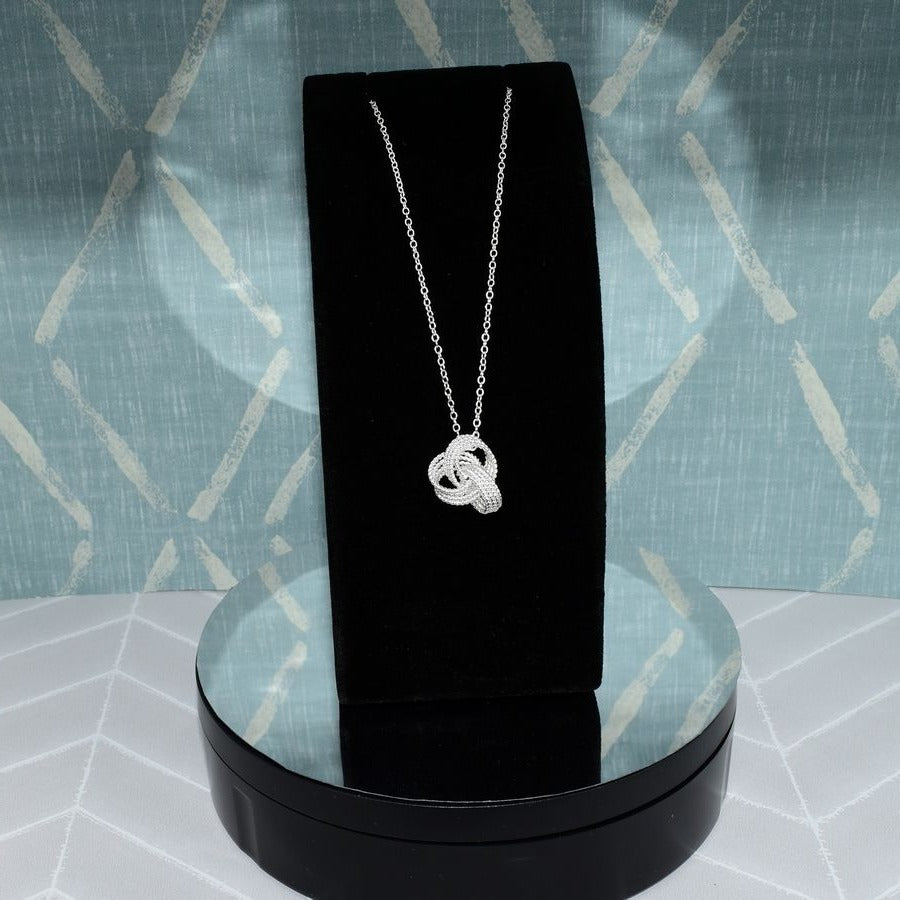 Delanie Love Knot Pendant Necklace Elegant Ribbon Design Silver Gift Boxed